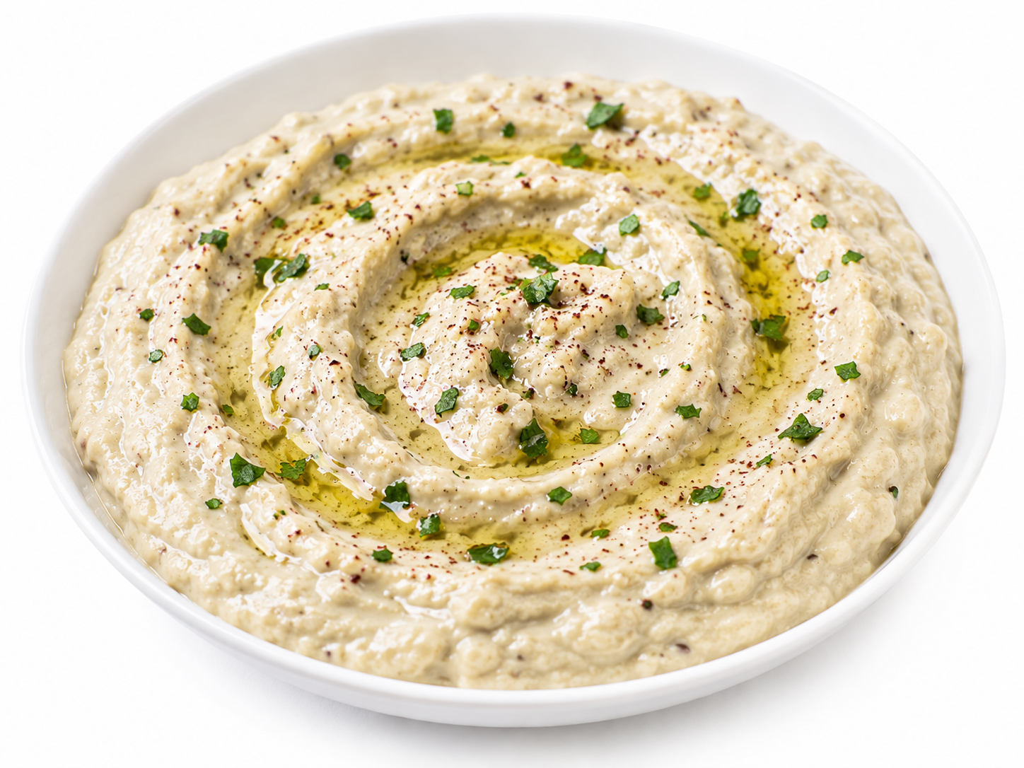 Creamy baba ghanoush with olive oil and herbs